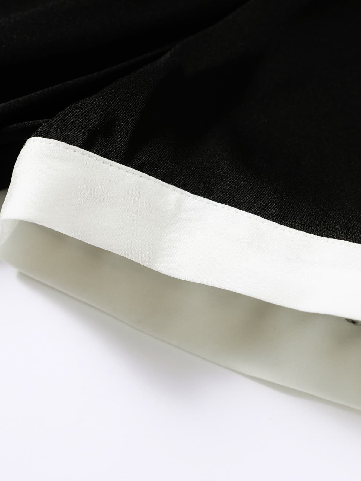 cuff of Minimalist Black Silk Dress