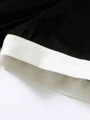 cuff of Minimalist Black Silk Dress