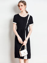 Front view of Minimalist Black Silk Dress