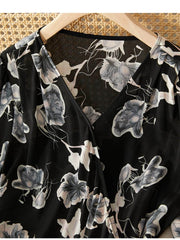 Chic Floral One - Piece Mulberry Silk Dress with elegant floral pattern on black fabric.