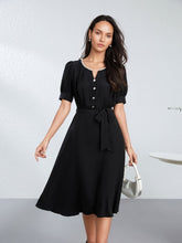 Our model is wearing 2025 Black Beaded Mulberry Silk Dress in the office