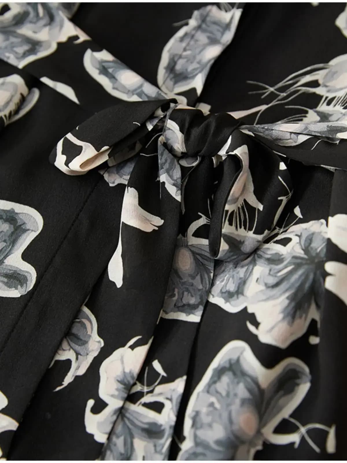 Close-up of 100% Mulberry Silk A-Line Dress - Black Midi Slim Fit