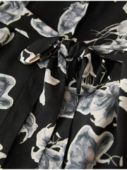 Close-up of 100% Mulberry Silk A-Line Dress - Black Midi Slim Fit