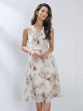 Our model is wearing 2025 Flowy Floral Mulberry Silk Dress in our office