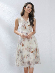 Our model is wearing 2025 Flowy Floral Mulberry Silk Dress in our office