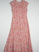 Elegant Floral Maxi Mulberry Silk Dress featuring a pink floral design and elegant silhouette.