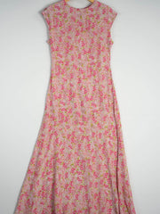 Elegant Floral Maxi Mulberry Silk Dress featuring a pink floral design and elegant silhouette.