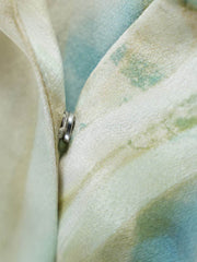 Close-up of soft, breathable fabric showcasing the luxurious texture of the Resort Style Mulberry Silk Dress.