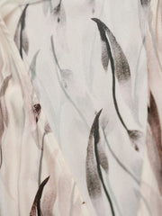 Detail of fabric print showcasing the design of the Sleeveless Floral Maxi Mulberry Silk Dress.