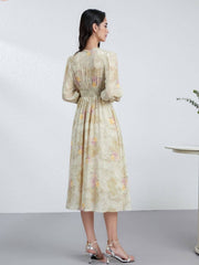 Elegant Mulberry Silk Dress with ruched waist, showcasing a beautiful floral pattern from the back view.