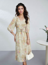 Elegant Mulberry Silk Dress with ruched waist and floral pattern, perfect for any occasion.