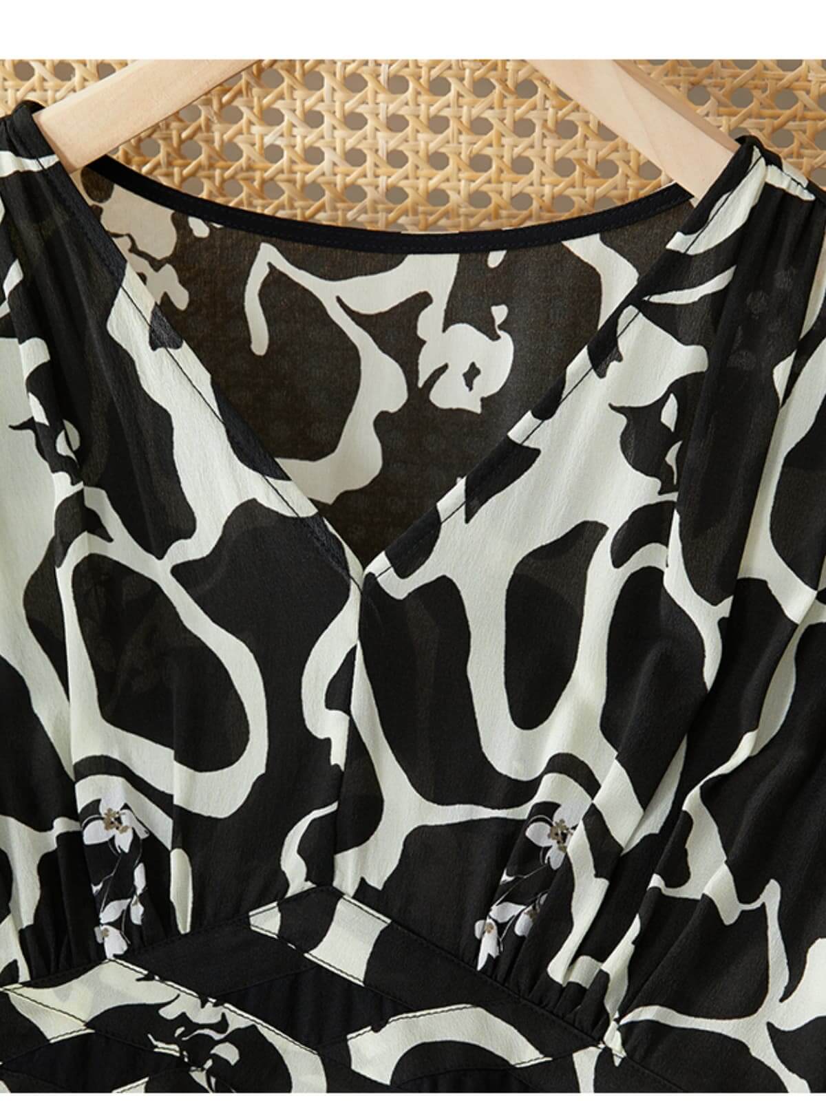 Floral Mulberry Silk Dress featuring an elegant black and white abstract pattern, perfect for any occasion.