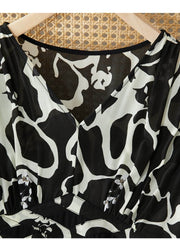 Floral Mulberry Silk Dress featuring an elegant black and white abstract pattern, perfect for any occasion.