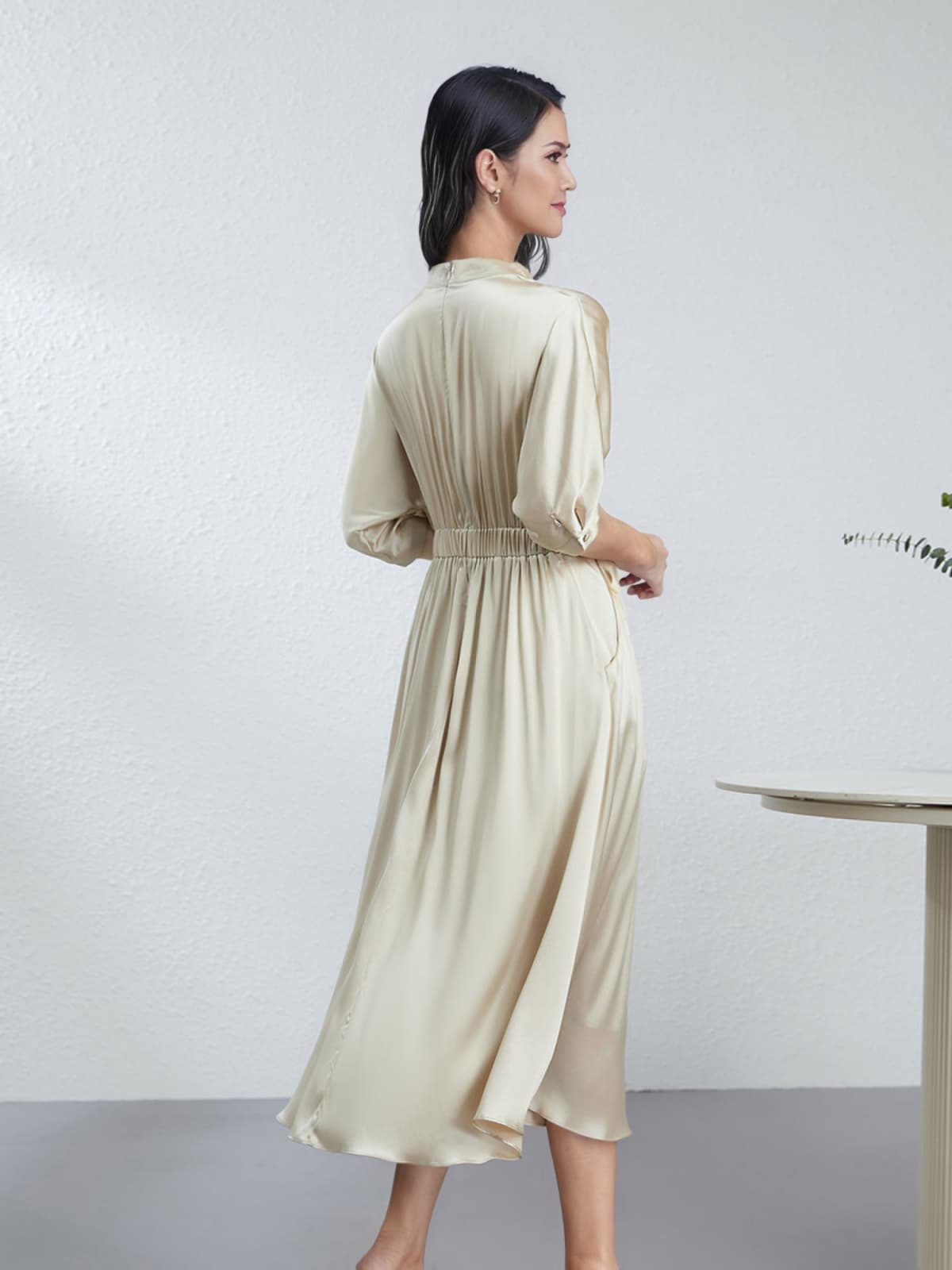 Side profile of Chic V - Neck Mulberry Silk Maxi Dress