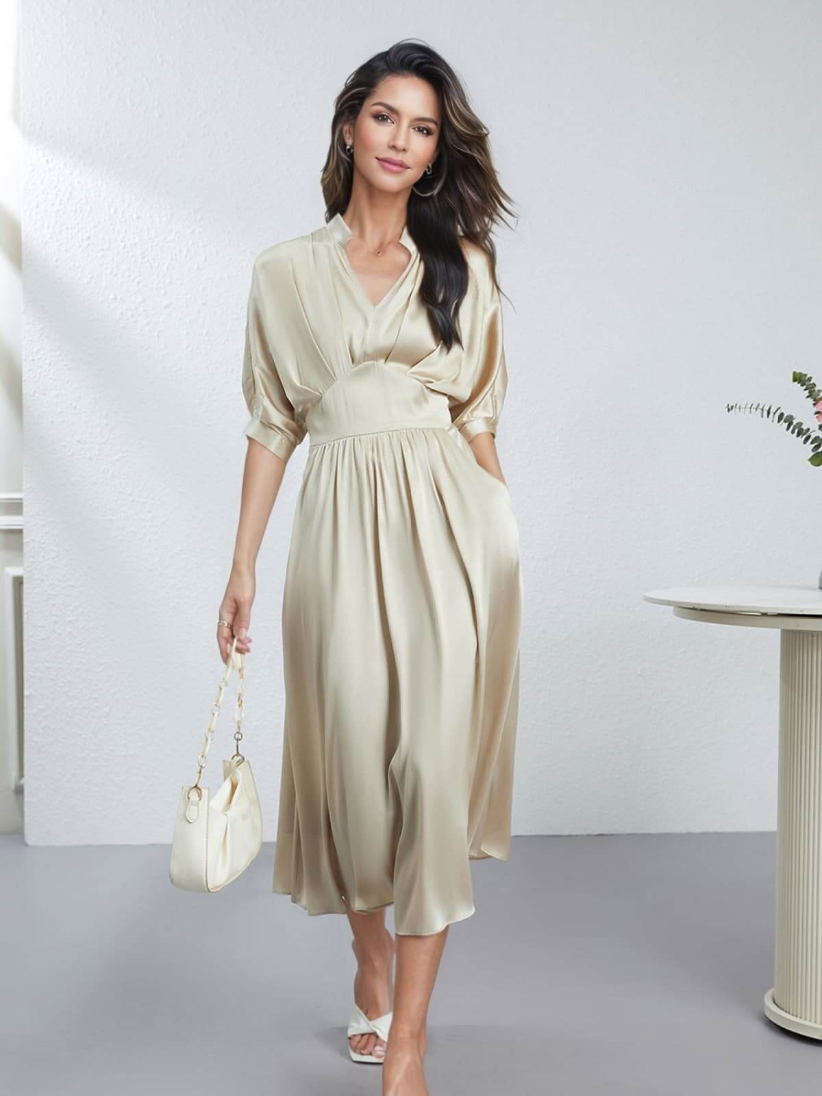 Model wearing Chic V - Neck Mulberry Silk Maxi Dress with a bag