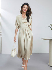Model wearing Chic V - Neck Mulberry Silk Maxi Dress with a bag
