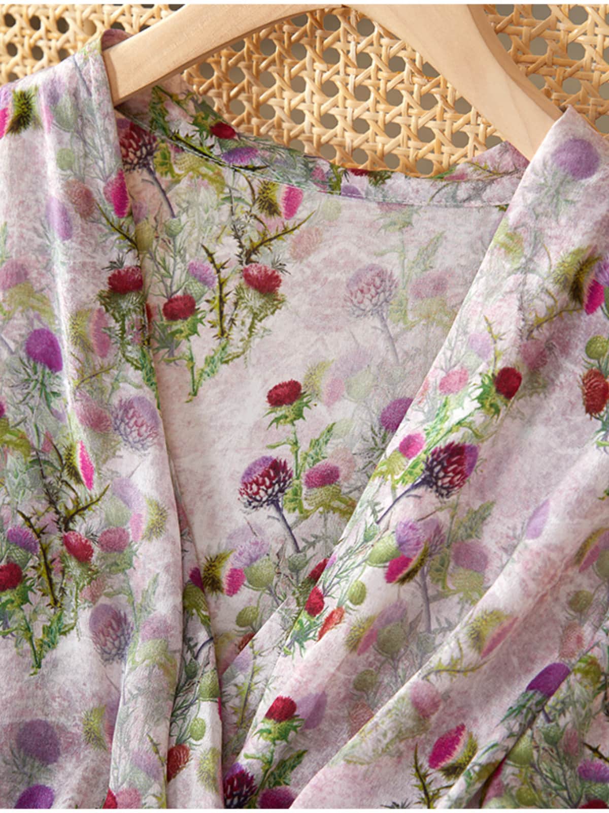 Luxury Mulberry Silk Maxi Dress featuring a floral design and luxurious texture.