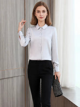 women's refined minimalist silk blouse collar and buttons in deep red color.