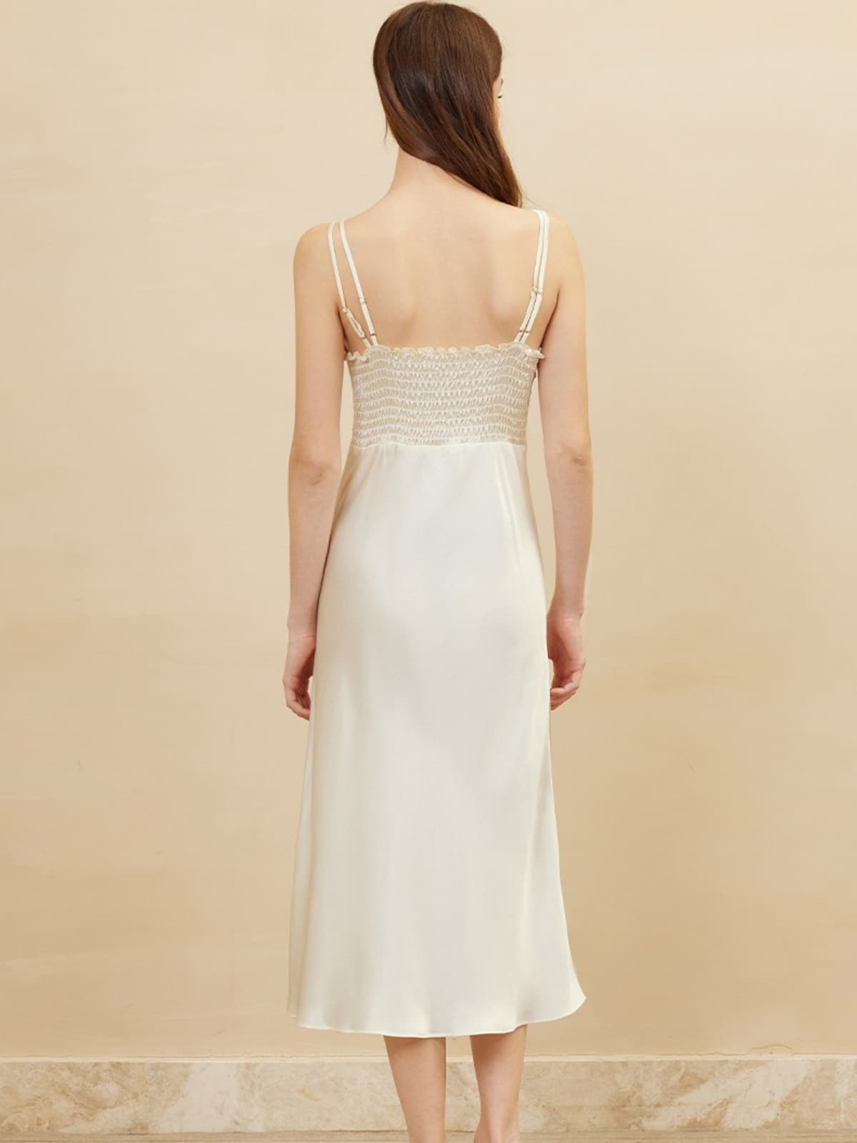 Back view of Elegant Spaghetti - Strap Pure Silk Dress in white