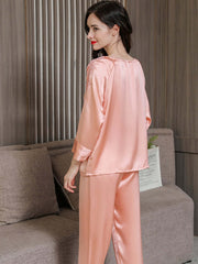 Back view of Women's Long - sleeved Lace Silk Pajama Set in pink