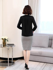 Back view of a woman wearing a Trendy Silk Women's Blouse with a patterned pencil skirt.