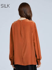 Back view of Women's Minimalist Silk Blouse