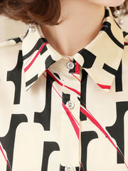 Luxury Printed Mulberry Silk Blouse for Women featuring a stylish collar and unique printed pattern.