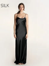 Model wearing Spaghetti Strap Silk Dress Elegant