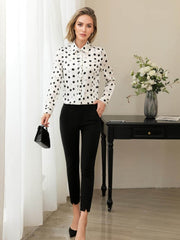 Luxury Printed Mulberry Silk Blouse for Women with polka dots, paired with fitted black pants and stylish accessories.
