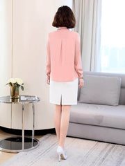 Versatile Mulberry Silk Blouse for Women in pink worn with a white skirt, showcasing a stylish back view in a modern living space.
