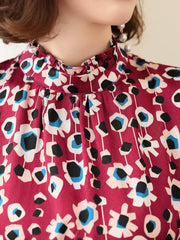 Vintage Floral Mulberry Silk Blouse for Women featuring a unique floral pattern and elegant ruffled neckline.