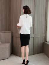 Elegant Lace Collar Silk Blouse for Women, back view, styled with a black skirt and holding a glass.