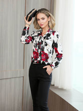 Bow Tie Printed Mulberry Silk Blouse for Women featured in a stylish outfit with floral design and elegant black pants.