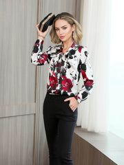 Bow Tie Printed Mulberry Silk Blouse for Women featured in a stylish outfit with floral design and elegant black pants.