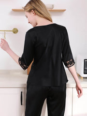 Back view of Women's Short - Sleeved Silk Pajamas Set in black