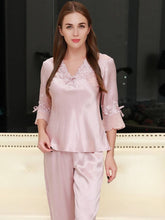 Front of Women's Lace Silk Pajama Set - Luxurious & Comfortable Nightwear in pink