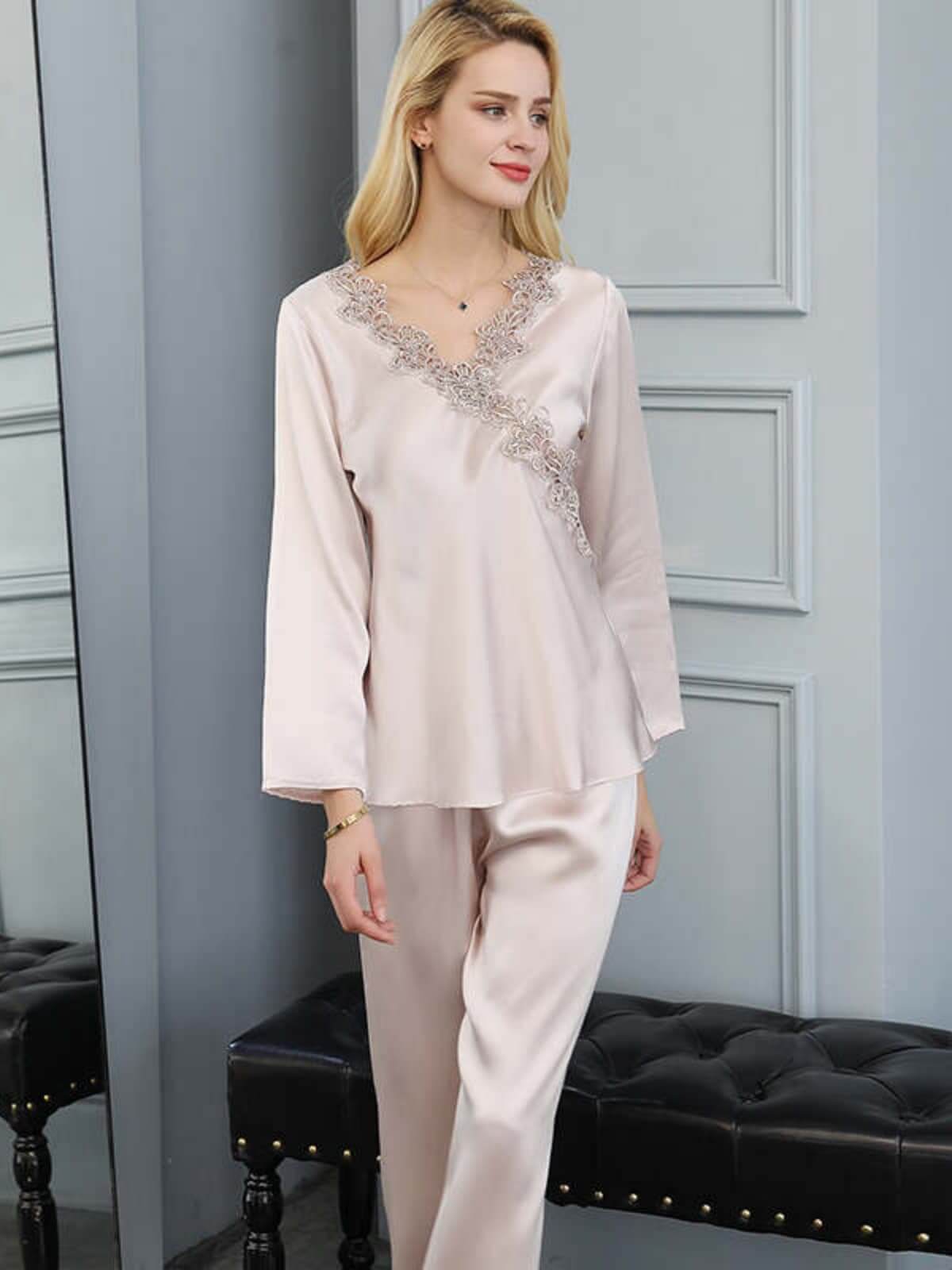 Model wearing Embroidered Long - Sleeved Silk PJs for Women at home