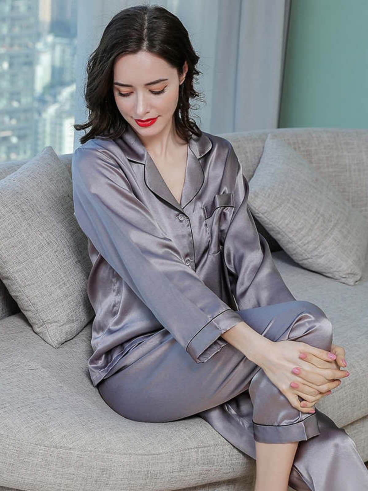 Model wearing Long - Sleeved Pure Silk Pajama Set for Women in gray at home