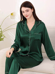 Model wearing Long - Sleeved Pure Silk Pajama Set for Women in dark green