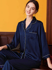 Model wearing Long - Sleeved Pure Silk Pajama Set for Women in navy blue