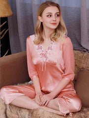 Model weaing Lace Silk Pajama Set for Women in pink color