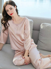 Model wearing Women's Minimalist Silk Pajama Set – Soft Loungewear at home