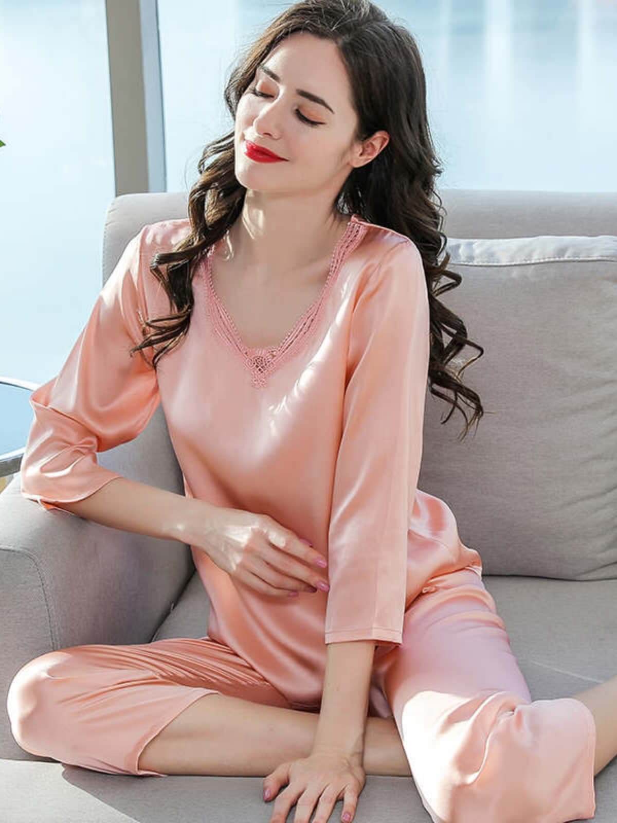Model wearing Women's Minimalist Silk Pajama Set – Soft Loungewear in pink color