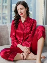 Model wearing Women's Long Sleeve Silk Pajama Set – Soft Sleepwear in red