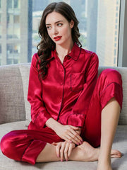 Model wearing Women's Long Sleeve Silk Pajama Set – Soft Sleepwear in red