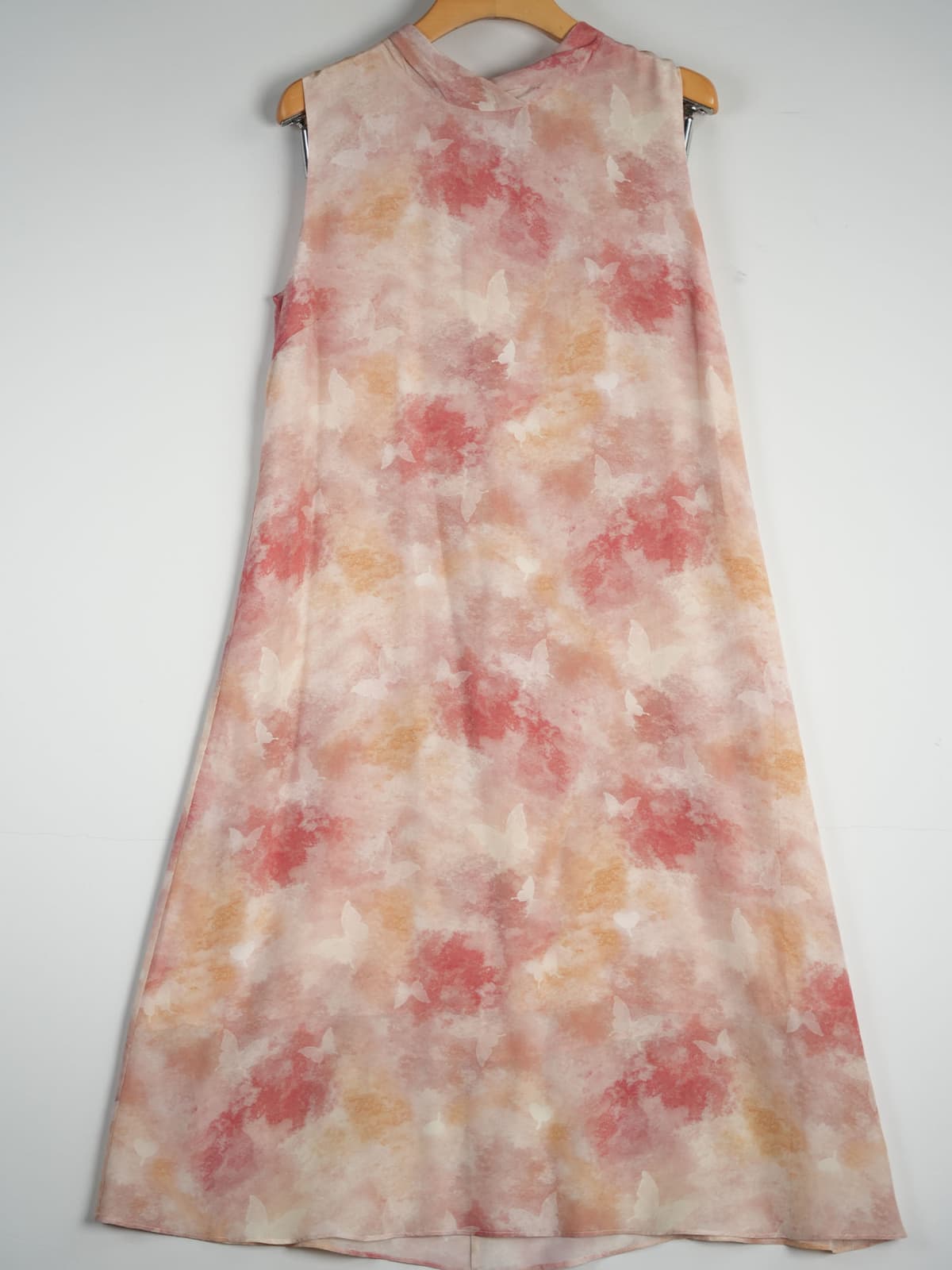 Floral Mulberry Silk Midi Dress featuring a pink and beige watercolor design on a sleeveless silhouette.