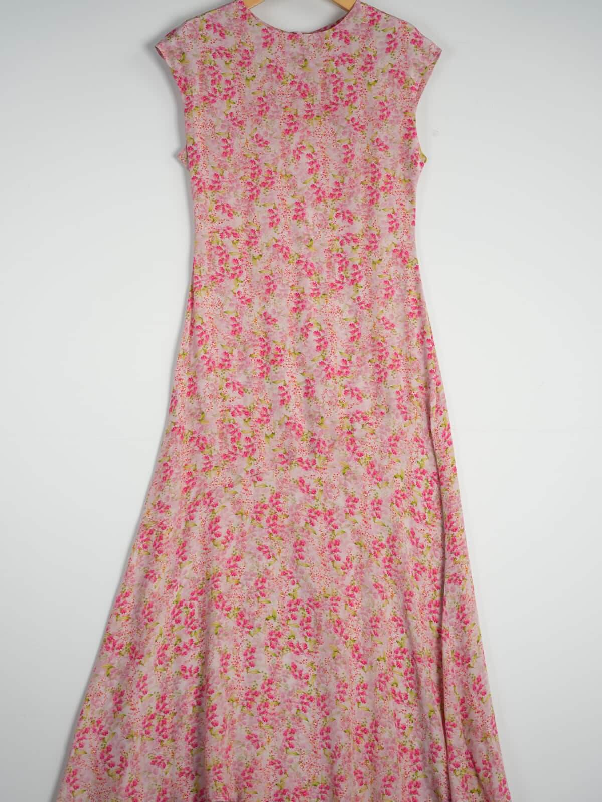 Elegant Floral Maxi Mulberry Silk Dress featuring a pink floral design and elegant silhouette.