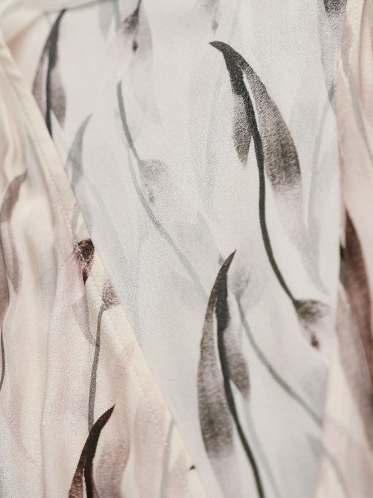 Detail of fabric print showcasing the design of the Sleeveless Floral Maxi Mulberry Silk Dress.