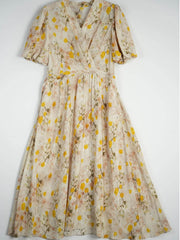 French Floral Mulberry Silk Maxi Dress with floral pattern in cream yellow tones and soft fabric.