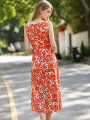 Graceful Mulberry Silk Maxi Dress worn by a woman holding sunflowers in a scenic outdoor setting.